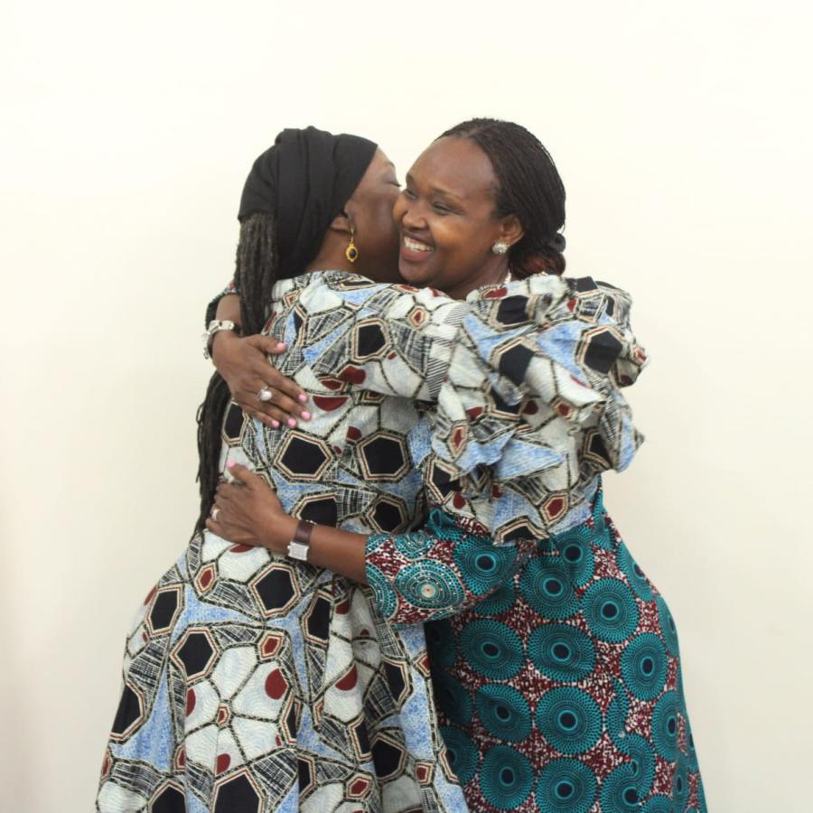 Min. Beysolow Nyanti hugs UN RC Umutoni