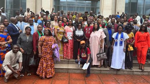 Group Photo of aspirants and participants standing at the stairs of the EJS Ministerial Complex
