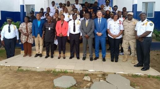 Group photo of officials of Police, UN Resident Coordinator, OHCHR Rep, and other participants